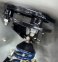 Custom made upper coilover mount fits around the stock coil spring locator ring - no need to remove that from the underside of the shock tower